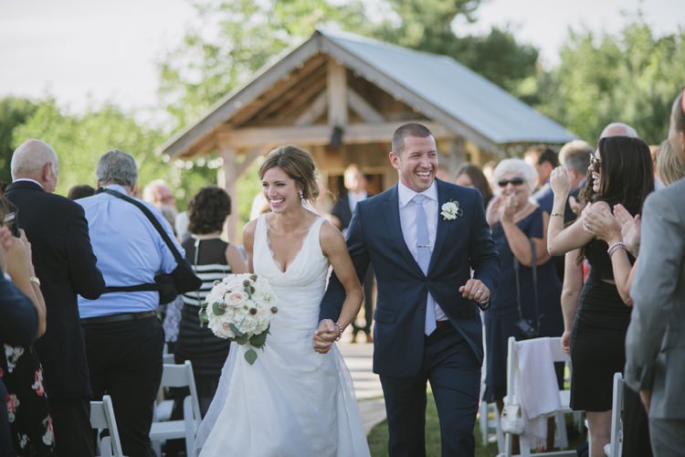 Outside Ceremony Rustic Wooden Hut Bride Lace V Neck Bridal Gown Blush White Bouquet Groom Navy Suit Light Blue Tie Guests Romantic Fresh Outdoor Wedding Ontario http://www.rebeccabose.com/