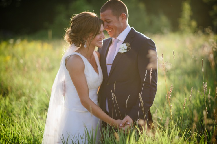 Bride Lace V Neck Lace Bridal Gown Veil Groom Navy Suit Light Blue Tie White Floral Buttonhole Green Grass Trees Romantic Fresh Outdoor Wedding Ontario http://www.rebeccabose.com/