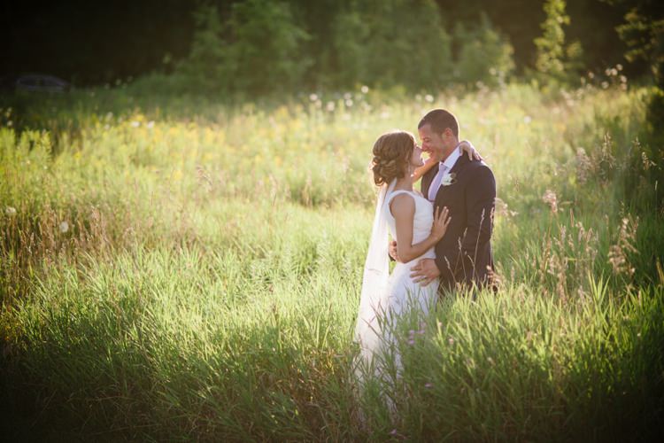 Bride Lace V Neck Lace Bridal Gown Veil Groom Navy Suit Light Blue Tie White Floral Buttonhole Green Grass Trees Romantic Fresh Outdoor Wedding Ontario http://www.rebeccabose.com/