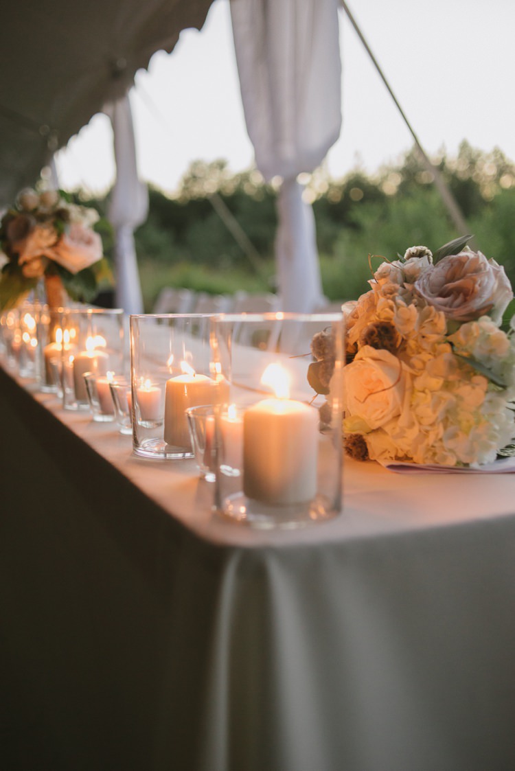 Outside Marquee Reception Candles Glass Holders Blush White Bouquets Roses Hydrangeas Romantic Fresh Outdoor Wedding Ontario http://www.rebeccabose.com/