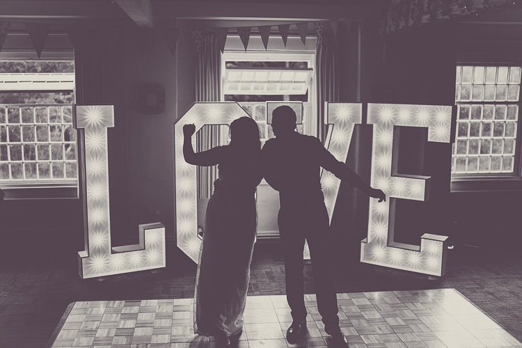 LOVE Lights Relaxed English Country Garden Party Wedding http://hayleybaxterphotography.com/