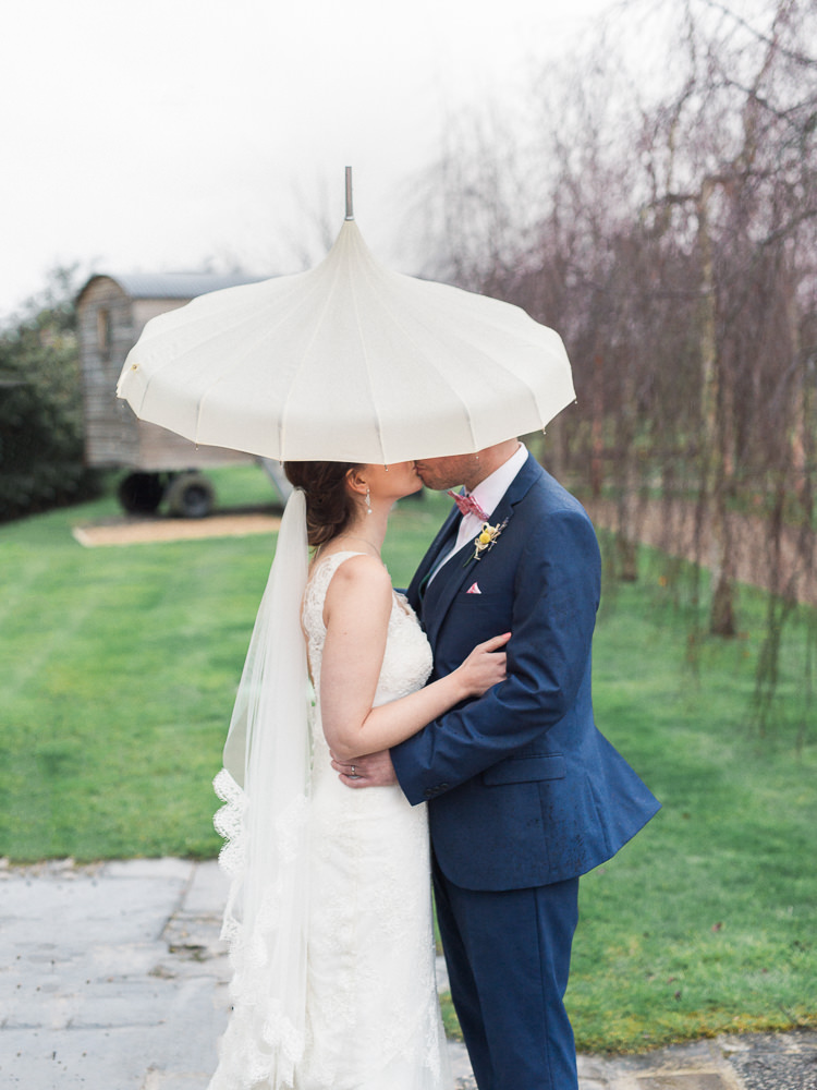 Rainy Umbrella Bride Groom Pretty Home Made Pastel Floral Wedding http://www.stephanieswannweddings.co.uk/