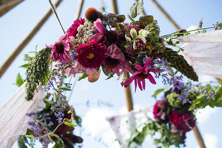 Hanging Flowers Tipi Circle Alternative Colourful Boho Wedding Ideas http://www.binkynixon.com/
