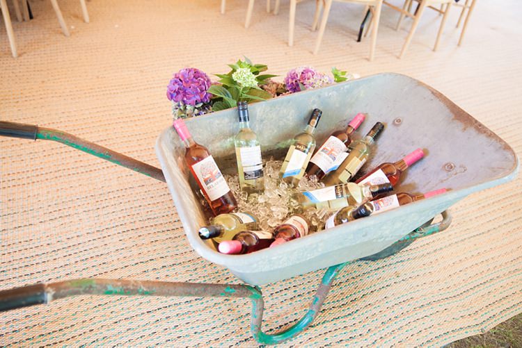 Wheelbarrow Drinks Wine Bottles Pink Rustic Tipi Woodland Wedding http://kerryannduffy.com/
