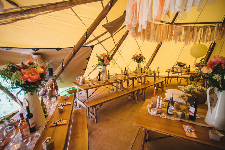 Rustic Tables Flowers Outdoorsy Colourful Tipi Wedding http://www.tierneyphotography.co.uk/