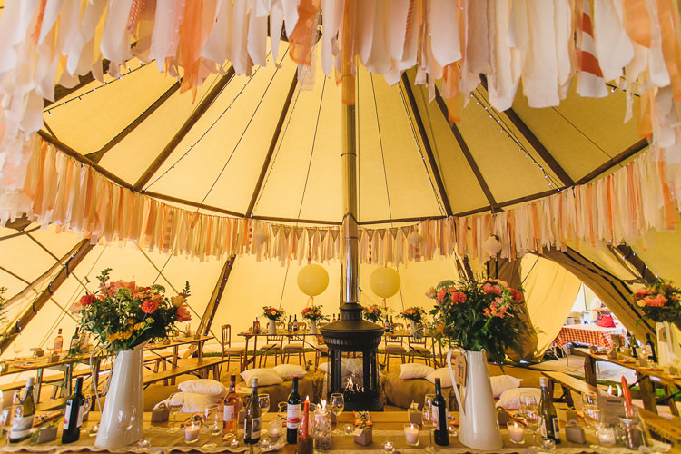 Coral Peach Rag Bunting Outdoorsy Colourful Tipi Wedding http://www.tierneyphotography.co.uk/