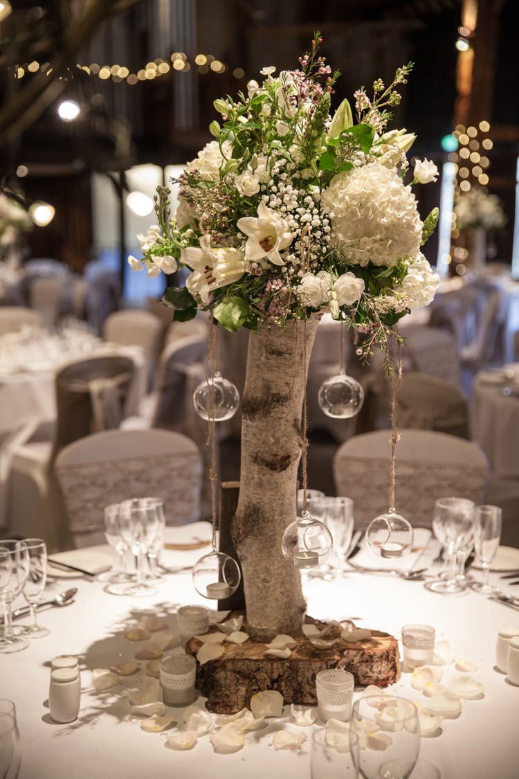 Tree Flower Log Centrepiece Decor Tables Cosy Winter Barn Wedding http://kerryannduffy.com/