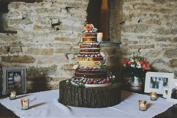 Naked Cake Table Log Stand Rustic Coral Barn Wedding http://jasonwilliamsphotography.com/