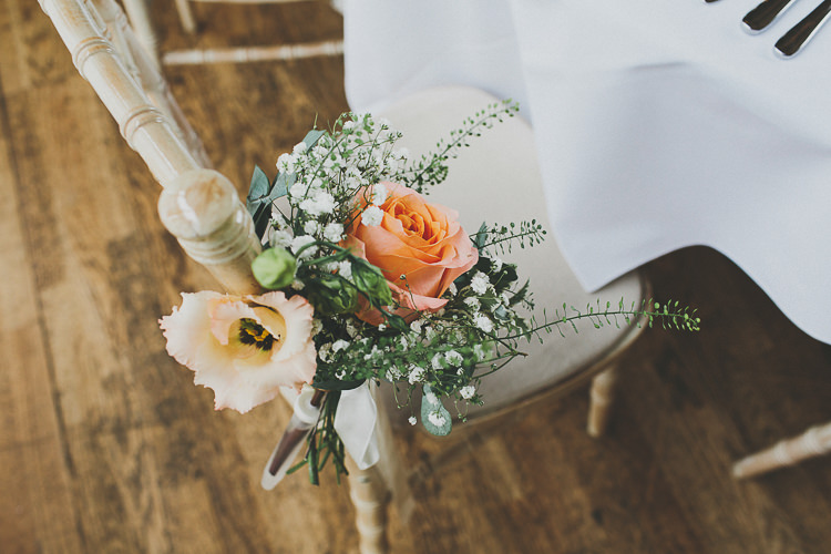 Chair Flowers Rose Pretty Rustic Coral Barn Wedding http://jasonwilliamsphotography.com/