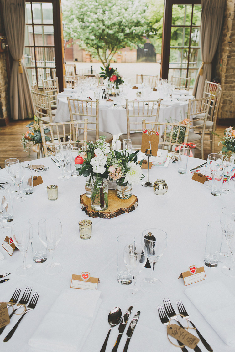 Log Slice Centrepiece Jar Flowers Decor Rustic Coral Barn Wedding http://jasonwilliamsphotography.com/