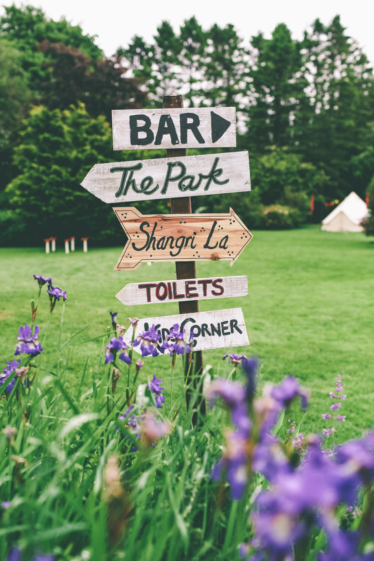Wooden Rustic Sign Post Home Made Glastonbury Festival Wedding http://www.emmaboileau.co.uk/
