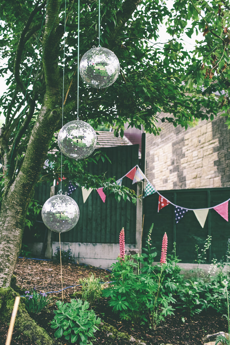 Disco Balls Bunting Home Made Glastonbury Festival Wedding http://www.emmaboileau.co.uk/