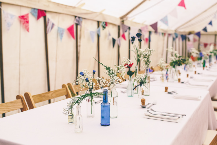 Flowers Bottles Long Tables Home Made Glastonbury Festival Wedding http://www.emmaboileau.co.uk/