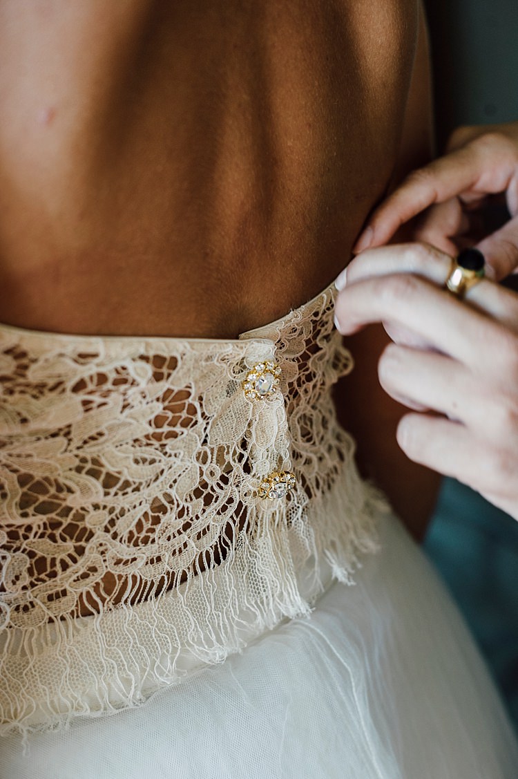 Bride Lace Halter-Neck Top Gold Crystal Buttons Tulle Skirt Outdoor Floral Countryside Wedding Veneto http://serenagenovese.com/