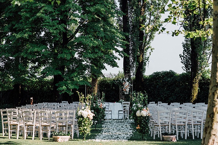 Ceremony Vintage Archway Floral Decorations Peach White Roses Hydrangea Greenery White Chairs Petals Aisle Outdoor Floral Countryside Wedding Veneto http://serenagenovese.com/