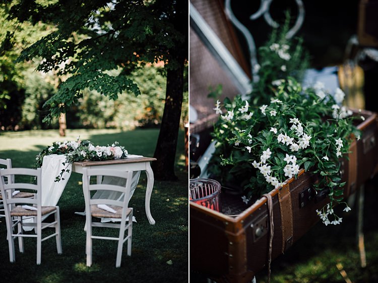 Ceremony Wooden White Table Chairs Vintage Suitcase Florals White Peach Roses Hydrangea Jasmine Outdoor Floral Countryside Wedding Veneto http://serenagenovese.com/