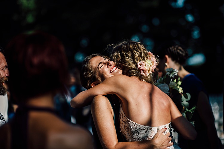Reception Bride Lace Halter-Neck Top Floral Hairstyle Friends Hugs Outdoor Floral Countryside Wedding Veneto http://serenagenovese.com/