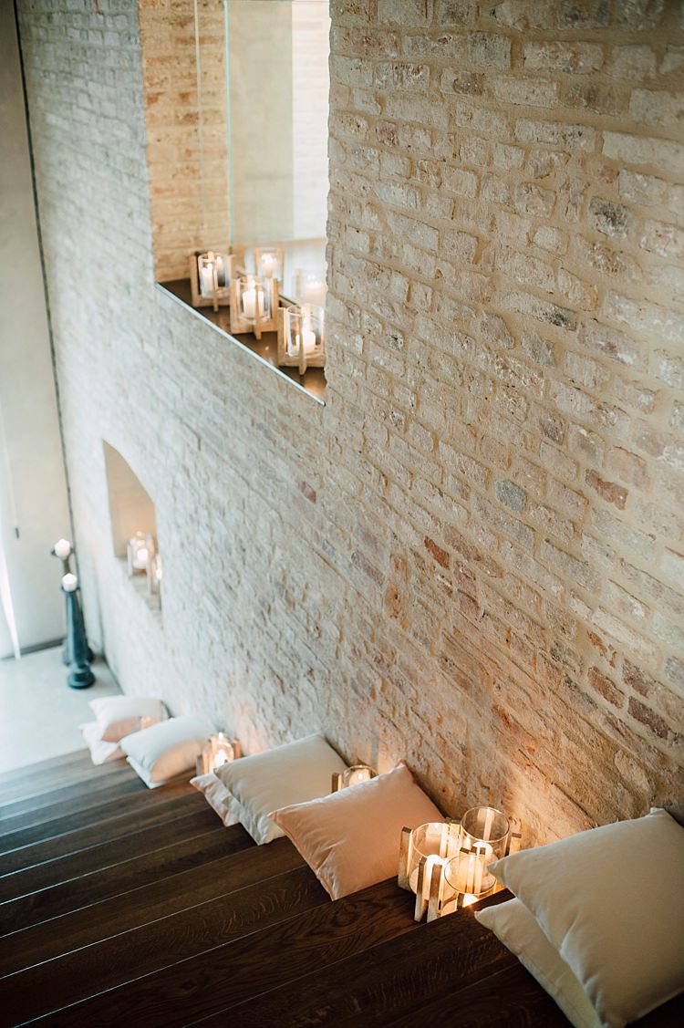 Cream Brick Wall Staircase Candles Cushions Outdoor Floral Countryside Wedding Veneto http://serenagenovese.com/
