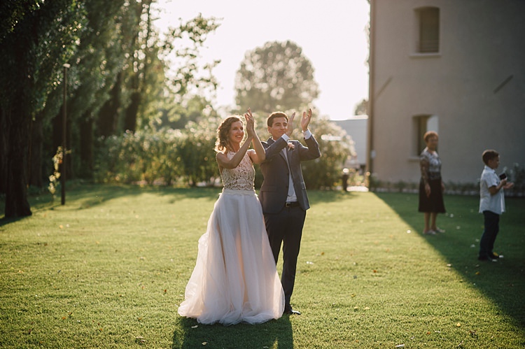 Bride Lace Halter-Neck Top Tulle Skirt Groom Grey Suit Silver Tie Applause Outdoor Floral Countryside Wedding Veneto http://serenagenovese.com/