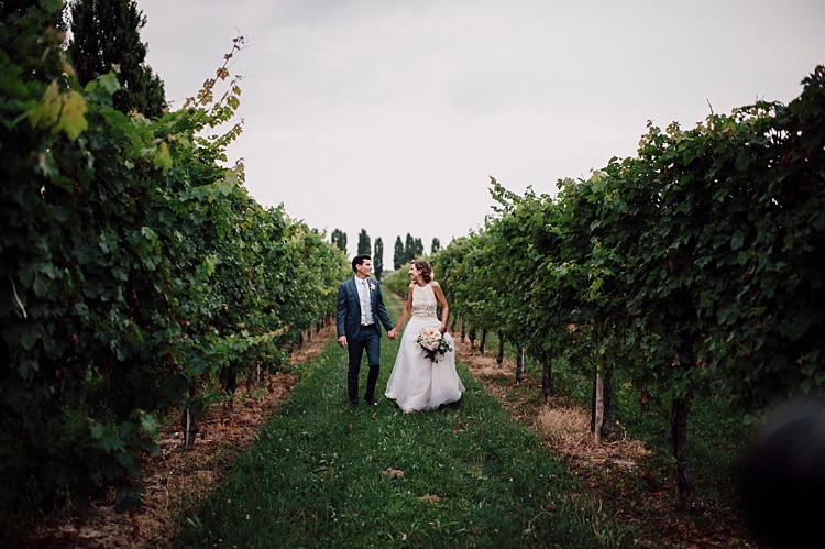 Bride Lace Halter-Neck Top Tulle Skirt Bouquet White Peach Roses Peonies Groom Grey Suit Silver Tie Green Vines Outdoor Floral Countryside Wedding Veneto http://serenagenovese.com/