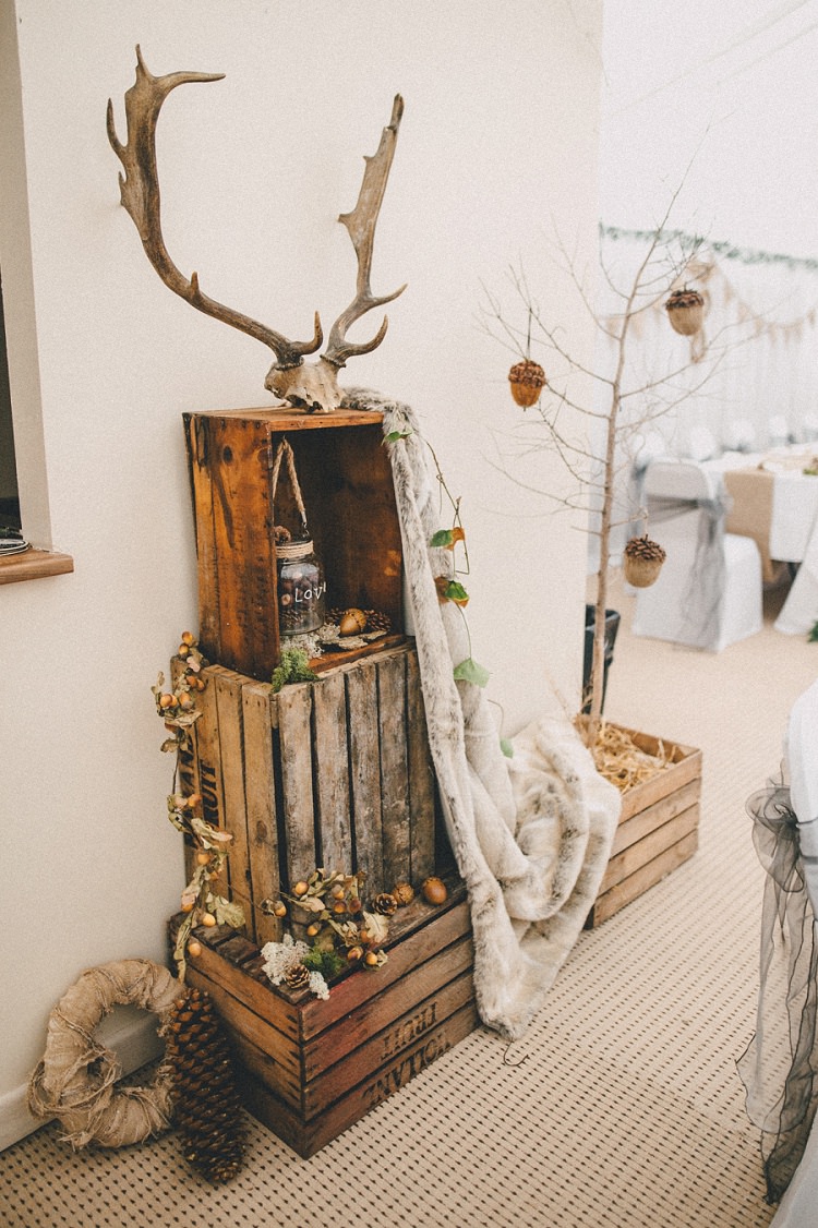 Crate Decor Antler Fur Pine Cones Woodland Inspired Autumn Wedding http://www.kerrydiamondphotography.com/