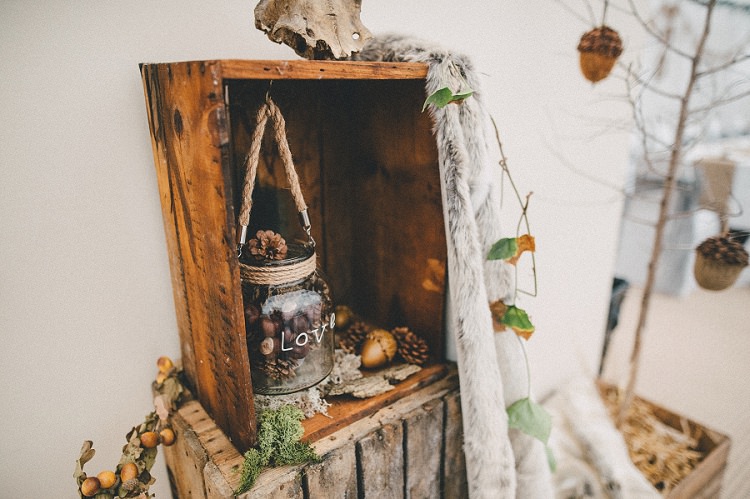 Crate Decor Antler Pine Cones Fur Woodland Inspired Autumn Wedding http://www.kerrydiamondphotography.com/