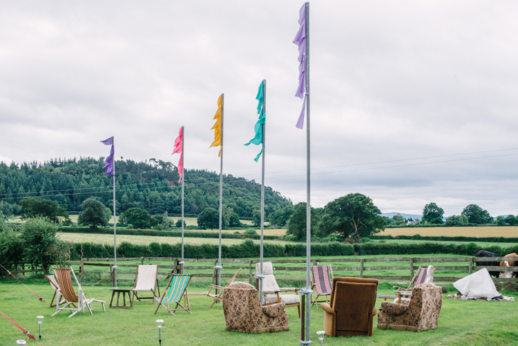 Festival Flags Rustic Seating Big Top Farm Party Wedding http://www.robinstudios.com/