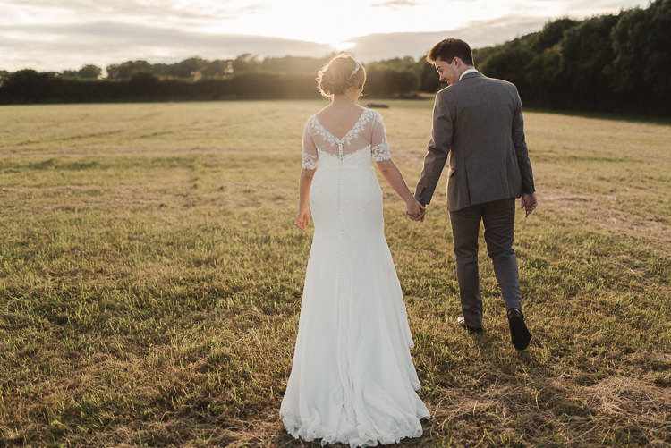 Lace Sleeve Dress Bride Bridal Justin Alexander Whimsical Floral Blush Grey Wedding https://www.scuffinsphotography.com/