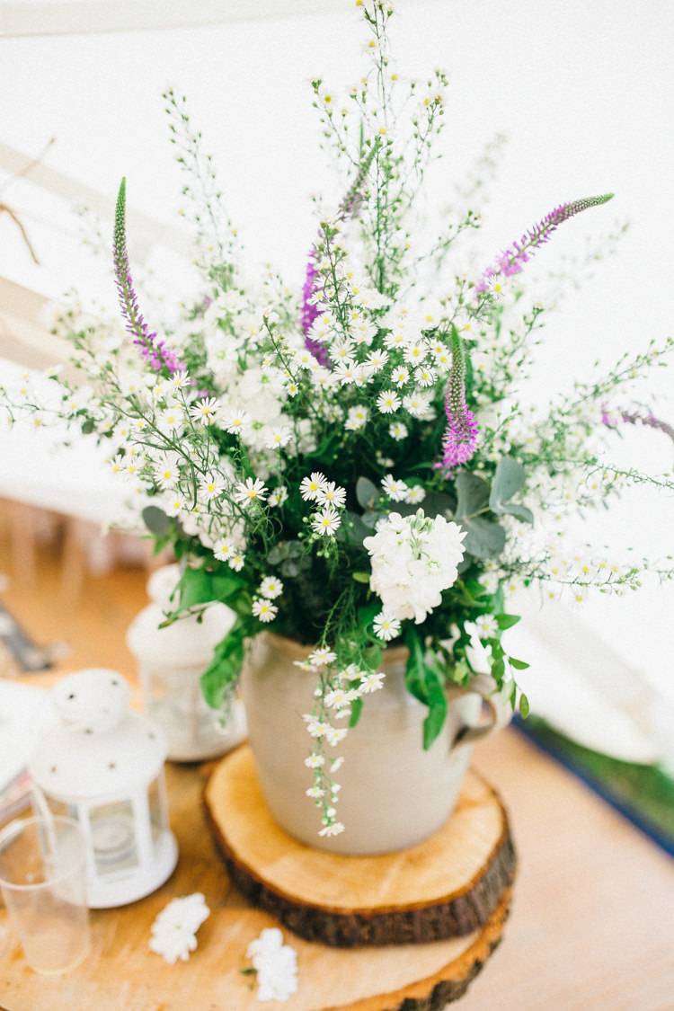Jug Flowers Daisy Daisies Log Slice Table Decor Magical Midsummer Night's Dream Wedding http://www.beatriciphotography.co.uk/