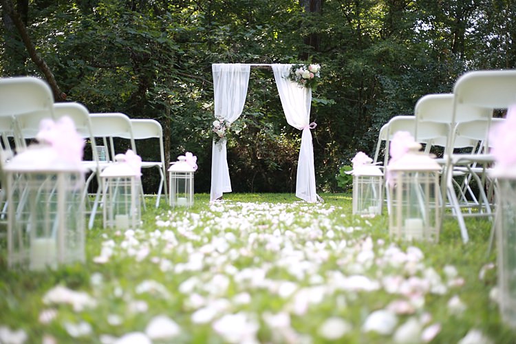 Outdoor Ceremony White Curtains Floral Bouquets Glass Candle Lantern Flower Petals White Chairs Soft Romantic Woodland Wedding Tennessee http://www.jessicaleephotographicart.com/