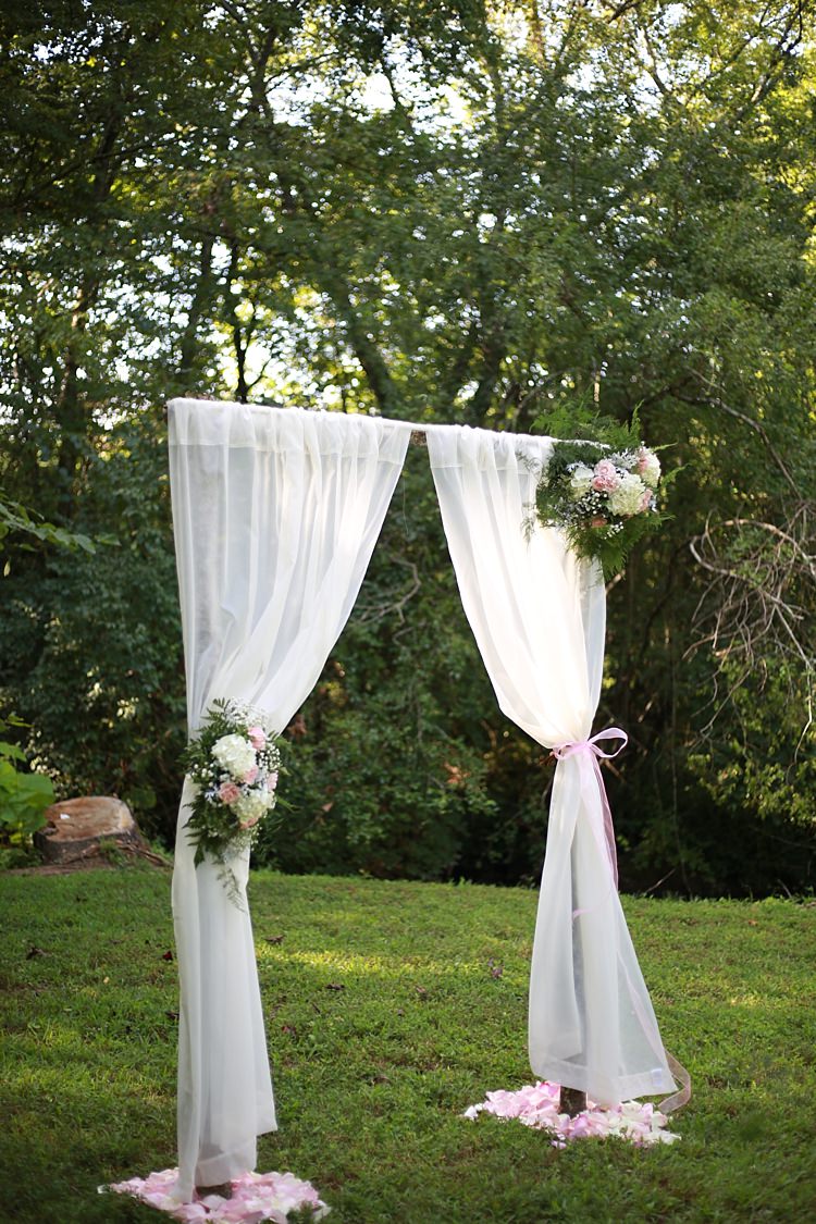Outdoor Ceremony White Curtains Floral Bouquets White Hydrangea Pink Roses Baby's Breath Flower Petals Trees Grass Soft Romantic Woodland Wedding Tennessee http://www.jessicaleephotographicart.com/