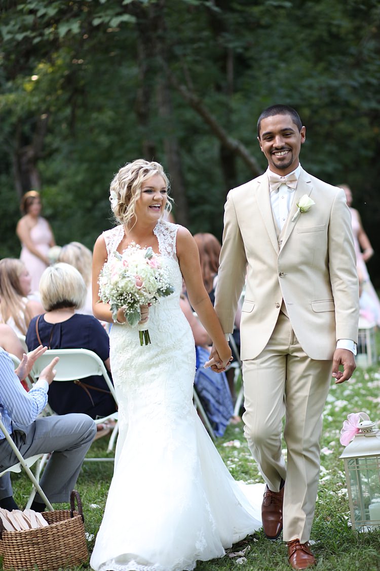 Outdoor Ceremony Bride Lace Mermaid Bridal Gown With Straps Floral Hairpiece Bouquet White Hydrangeas Pink Roses Baby's Breath Groom Beige Suit White Shirt Pale Pink Bow Tie Guests Trees Grass Flower Petals Soft Romantic Woodland Wedding Tennessee http://www.jessicaleephotographicart.com/
