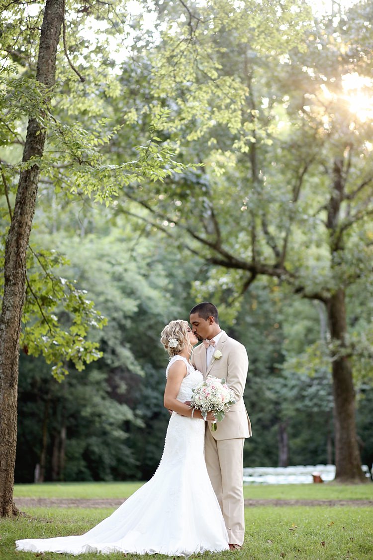 Bride Lace Mermaid Bridal Gown With Straps Floral Hairpiece Bouquet White Hydrangea Pink Roses Baby's Breath Groom Beige Suit White Shirt Pale Pink Bow Tie Trees Sunlight Grass Soft Romantic Woodland Wedding Tennessee http://www.jessicaleephotographicart.com/