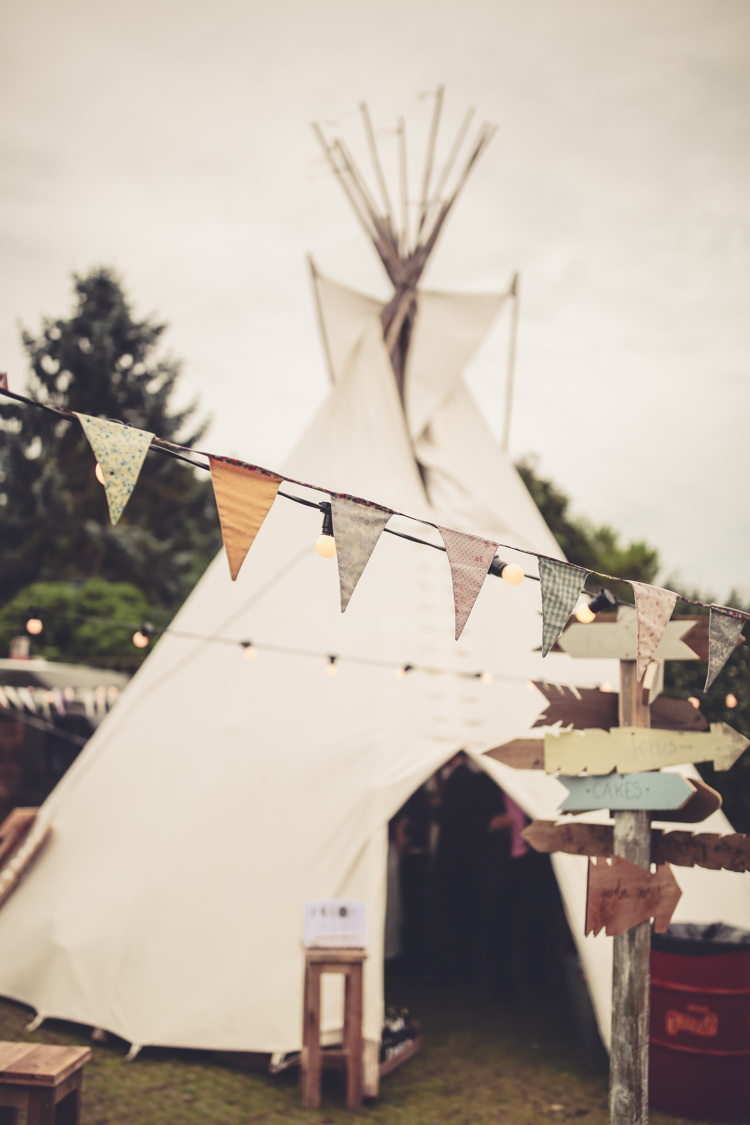 Tipi Bunting Sing Festoon Lights Homespun Festival Village Hall Wedding http://www.himandherweddingphotography.co.uk/