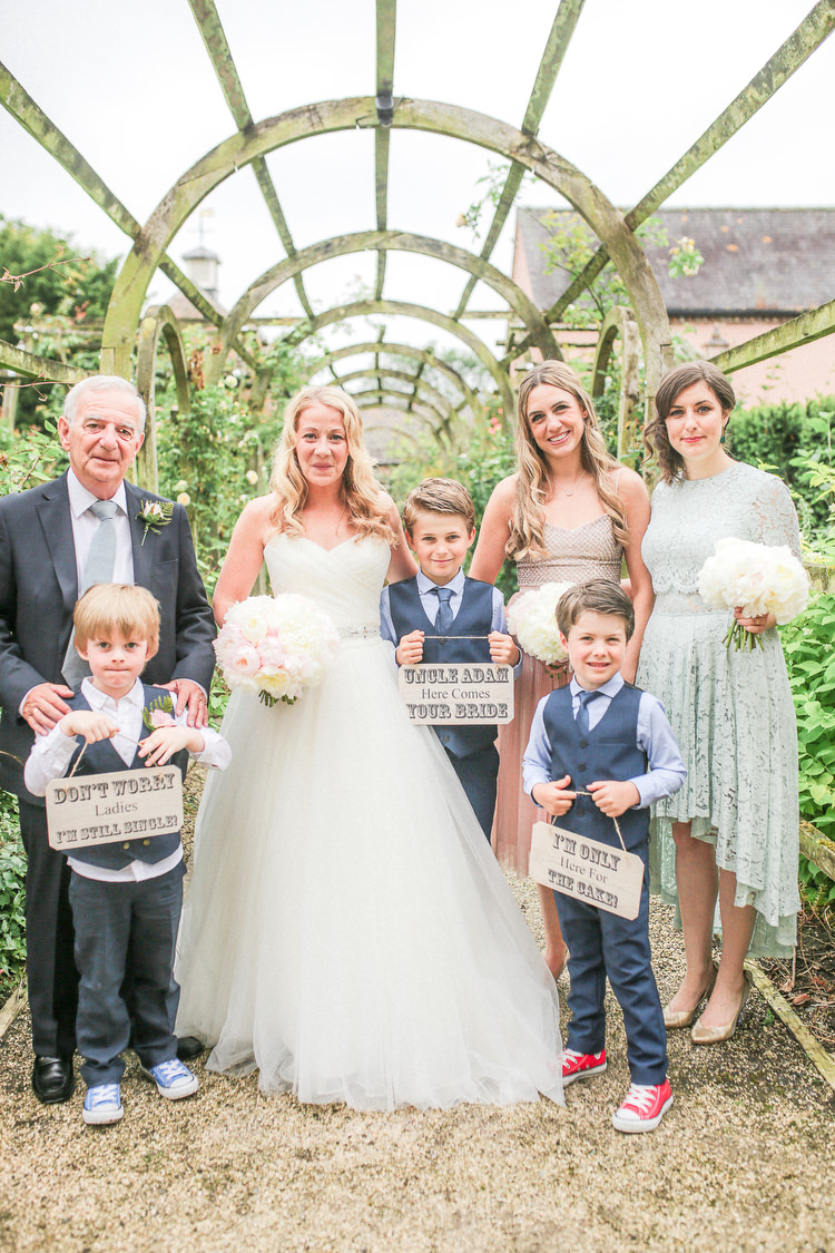 Page Boys Waistcoats Signs Converse Romantic Pink Summer Glamping Wedding http://helenrussellphotography.co.uk/