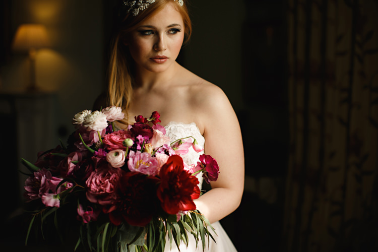 Bouquet Flowers Bride Bridal Red Burgundy Pink Rose Opulent Rich Tipi Wedding Ideas http://hbaphotography.com/