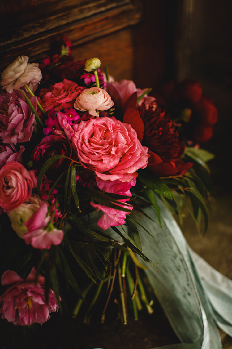 Bouquet Flowers Bride Bridal Red Burgundy Pink Rose Ribbon Opulent Rich Tipi Wedding Ideas http://hbaphotography.com/