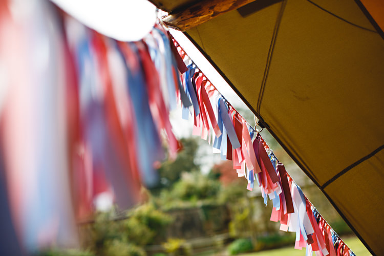 Ribbon Bunting Opulent Rich Tipi Wedding Ideas http://hbaphotography.com/
