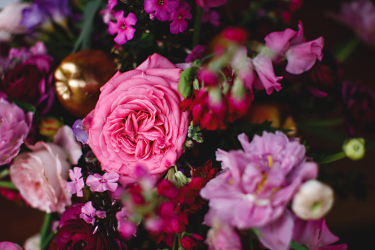 Pink Purple Roses Flowers Opulent Rich Tipi Wedding Ideas http://hbaphotography.com/
