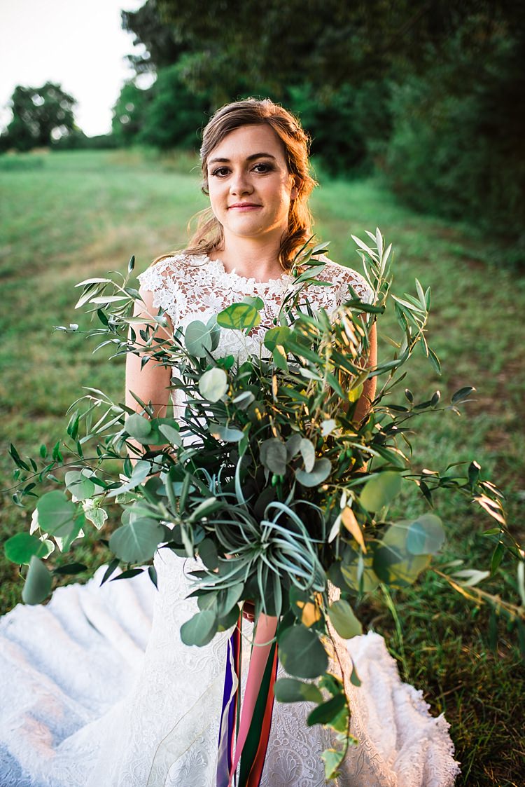 Bride Lace Cap Sleeve Wedding Gown Bouquet Greenery Leaves Multicoloured Ribbons Outdoors Ethereal Boho Wedding Ideas http://perfectcapturephoto.com/