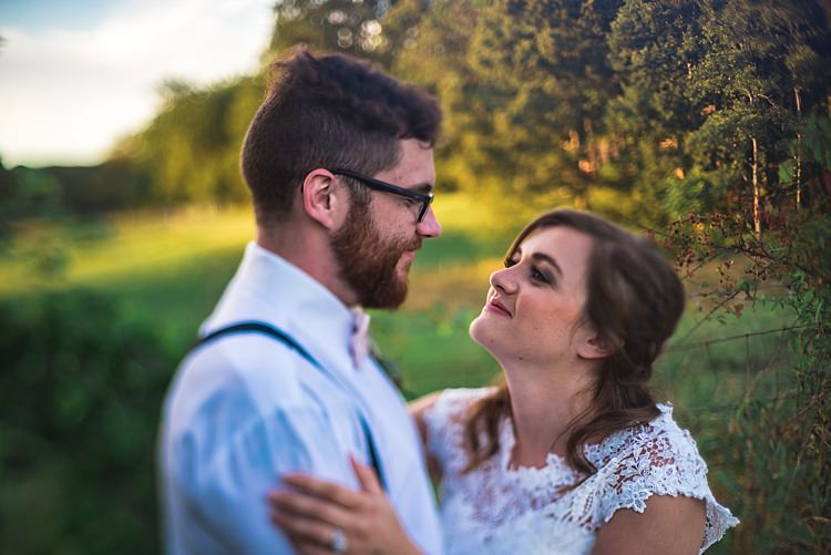 Bride Lace Bridal Gown With Buttons Groom Suspenders Cream Bow Tie Glasses Trees Grass Ethereal Boho Wedding Ideas http://perfectcapturephoto.com/