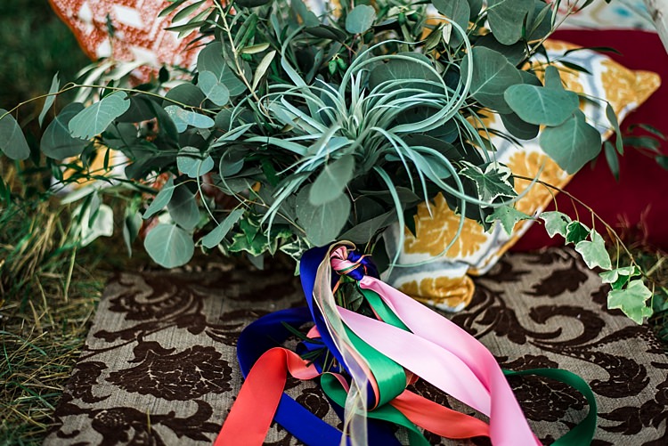 Bouquet Greenery Leaves Multicoloured Ribbons Patterned Cushions Rug Grass Ethereal Boho Wedding Ideas http://perfectcapturephoto.com/