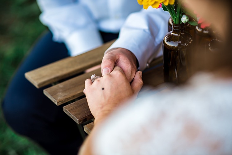 Bride Groom Holding Hands Multicoloured Florals Brown Glass Vases Table Ethereal Boho Wedding Ideas http://perfectcapturephoto.com/