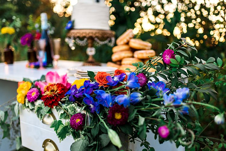 Dessert Table Decorated With Multicoloured Florals Wedding Cake Gold Stand Donuts Wine Ethereal Boho Wedding Ideas http://perfectcapturephoto.com/