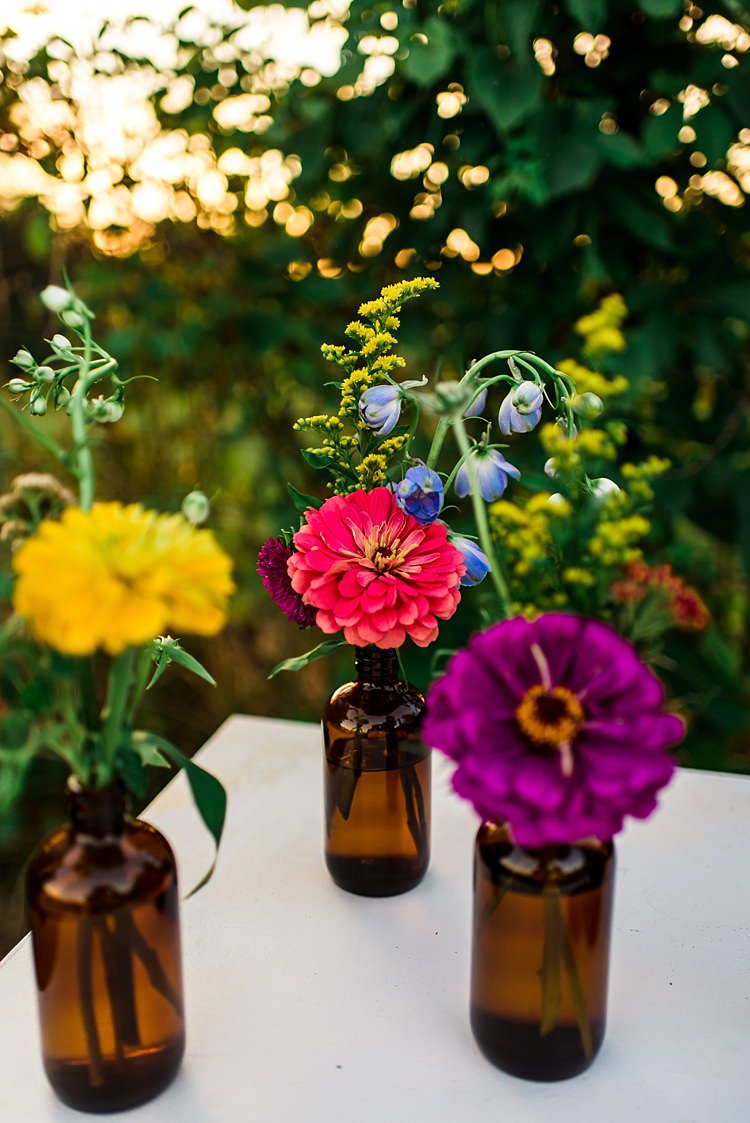 Multicoloured Florals Red Yellow Purple Brown Glass Vases Ethereal Boho Wedding Ideas http://perfectcapturephoto.com/