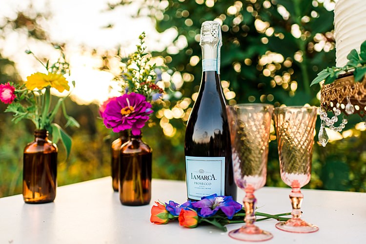 Dessert Table Champagne Pink Glasses Wedding Cake Gold Stand Multicoloured Flowers Brown Glass Vases Ethereal Boho Wedding Ideas http://perfectcapturephoto.com/