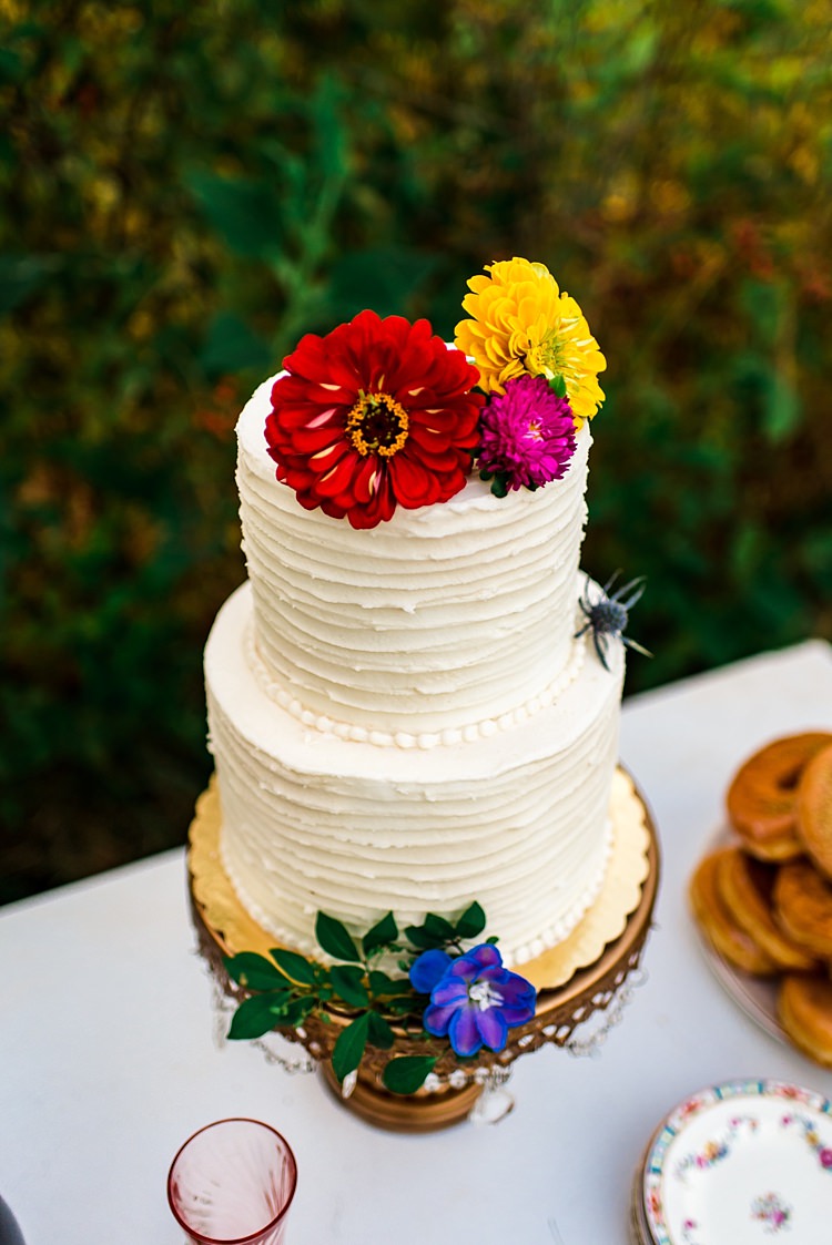 Wedding Cake Red Yellow Pink Purple Flowers Gerbra Delphinium Gold Stand Donuts Vintage China Ethereal Boho Wedding Ideas http://perfectcapturephoto.com/
