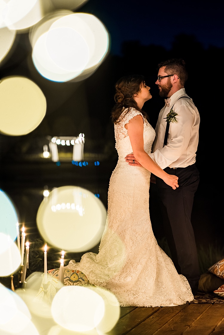 Bride Lace Bridal Gown With Buttons Groom Navy Pants Suspenders Cream Bow Tie Buttonhole Fairy Lights Candle Sticks Patterned Cushions Ethereal Boho Wedding Ideas http://perfectcapturephoto.com/