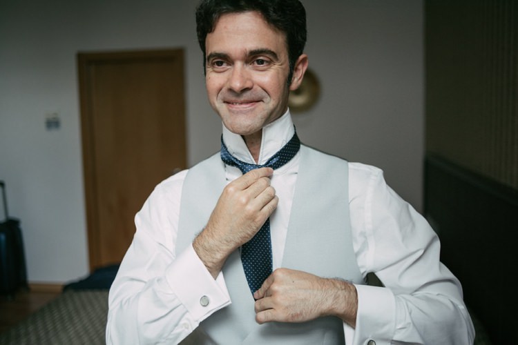 Groom White Shirt Grey Vest Polka Dot Tie Style Romantic Bohemian Spain Wedding http://saralobla.com/
