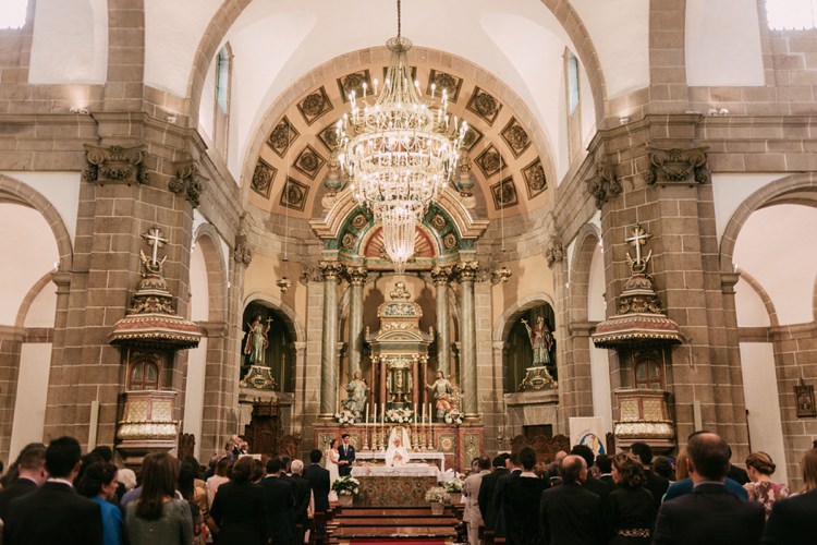 Church Ceremony Bride Groom Guests Chandelier Romantic Bohemian Spain Wedding http://saralobla.com/